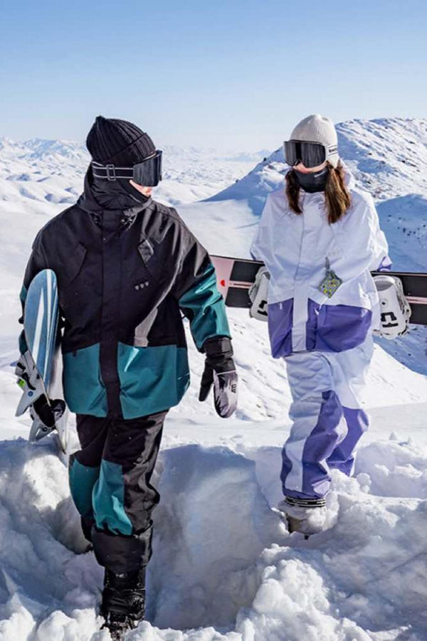 yolosnowclub powline epic snow pants models couple snowboarders